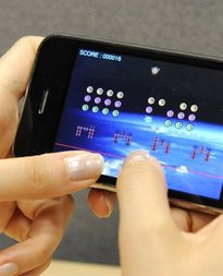 Tetsuya Ide doesn't own an iPhone, but the teenage computer boffin is betting that Apple's hit gadget is the key to having a new generation of video game players in the palm of his hand.